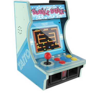 Mini máquina arcade retro Bubble Bobble de Taito con joystick rojo y botones de colores, recreativa clásica de sobremesa con pantalla LCD y diseño vintage azul
